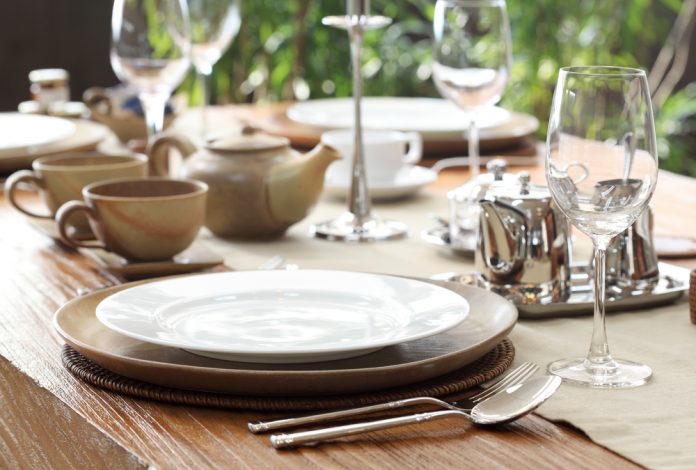 Option table setting with square plates and a complete set of forks, knives and spoons