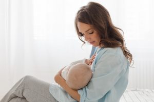 Woman feeding baby